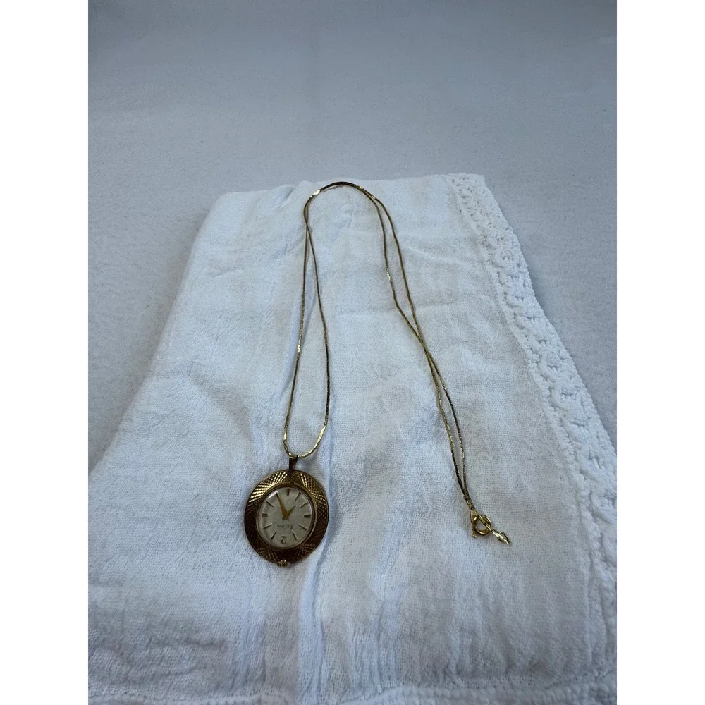 Vintage Bulova Womens OS Pendant Watch Necklace Gold Textured Bezel Swiss Made